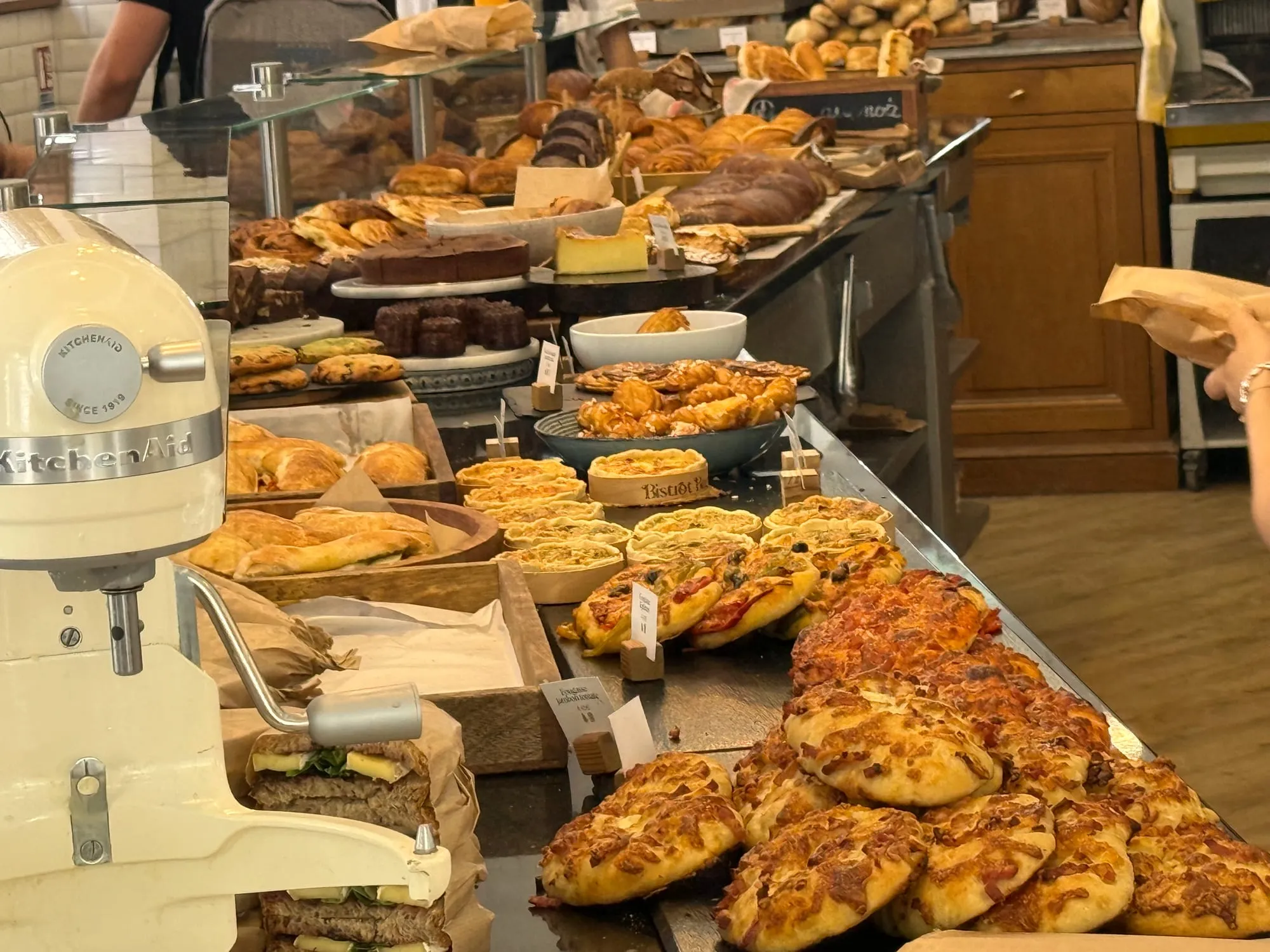 Bakery counter with savory quiches and tarts